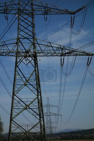 Photo for Energy supply with a 380 kv power line and power pole - Royalty Free Image