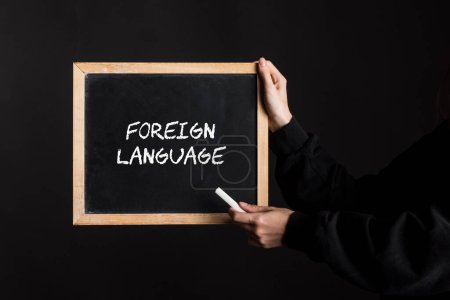 Foto de Símbolo para una lengua extranjera, signo con una lengua extranjera - Imagen libre de derechos