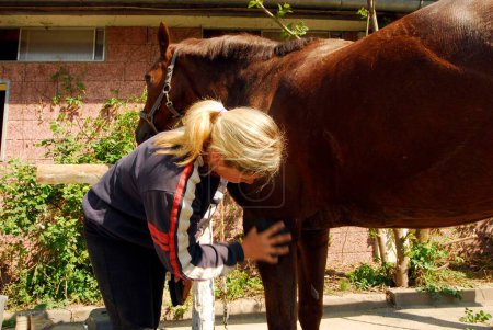 Prendre soin des chevaux comme une tâche aimante