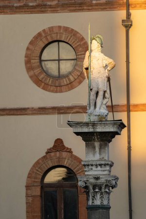 Photo for The sun illuminates the statue of Saint Vitalis ,Piazza del Popolo ,Ravenna,Italy - Royalty Free Image
