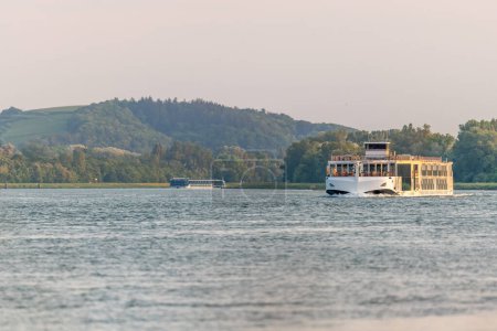 Photo for Tourist boating on the Rhine between Strasbourg and Bale. Bas-Rhin, Collectivite europeenne d'Alsace,Grand Est, France. - Royalty Free Image