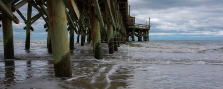 Waves striking one of the piers at Myrtle Beach in South Carolina