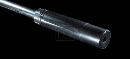 Photo for Suppressor mounted on a rifle barrel on a black background - Royalty Free Image