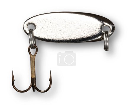 Photo for Shadow under a metallis spoon for fishing that shiny with treble hook below - Royalty Free Image