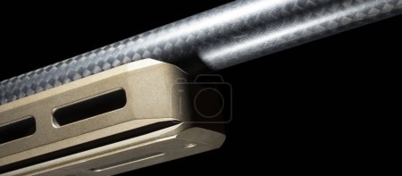 Photo for Slots and holes on a precision rifle with carbon barrel for attaching a bipod, tripod or other gear - Royalty Free Image