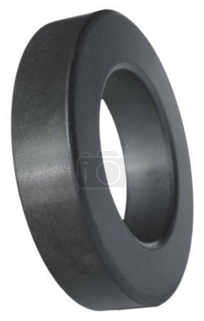 Photo for Round ring made from an iron compound used in a variety of electronic projects including those in ham radio circuits - Royalty Free Image