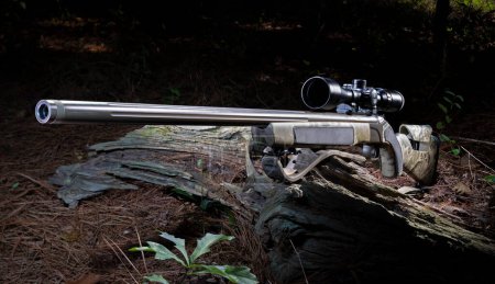 Fifty caliber modern in line muzzle loader rifle with riflescope on board