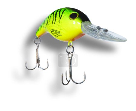 Fishing lure designed to be cast out and reeled back with two treble hooks with green, yellow and orange color and a shadow behind.