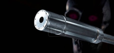 Photo for Purple eyed skull behind a silencer on a black background - Royalty Free Image