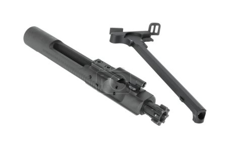 Bolt carrier group and charging handle for an AR-15 isolated in a studio shot.