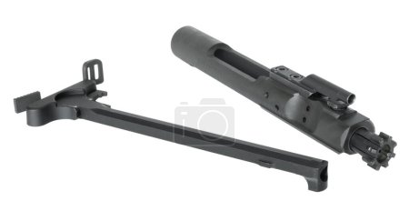 Charing handle and bolt carrier group removed from an assault rifle isolated in a studio shot.