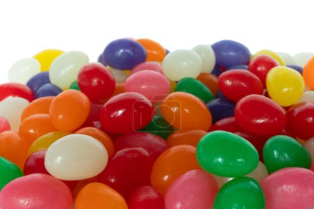 Colorful pile of jelly beans with red, orange, yellow, green, purple and white treats for the child in everyone.