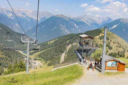 Photo for La Colmiane resort in summer, with its chairlift and zip line.. Station de La Colmiane en ete, son telesiege, sa tyrolienne. - Royalty Free Image