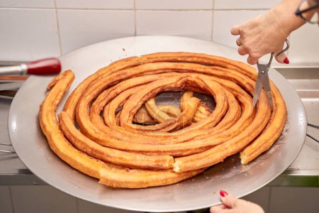 Photo for Spanish churros and porras thread before cutting. Churros. Porras. High quality photo - Royalty Free Image