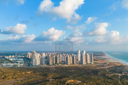 Photo for Netanya, Israel, September 3, 2022. Aerial view of the construction of new apartment buildings on the Mediterranean coast in Israel. The new residential area of skyscrapers. High-quality photo - Royalty Free Image
