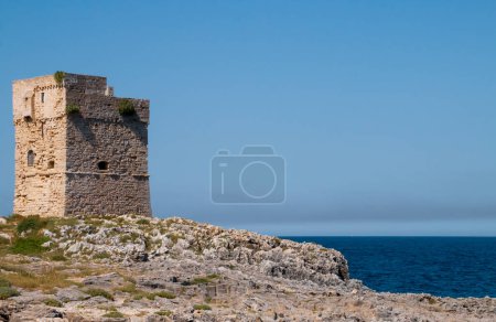 Photo for Palane Tower on the Adriatic coast of Marina Serra, Italy. It was built in the 16th century as part of the defensive system against Turkish raids by Saracen pirates. - Royalty Free Image