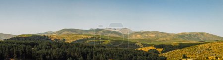 Photo for Morning view of the northern Sierra de Gredos from Hoyos del Espino, Avila, Spain. Silhouette of the peaks of the formation of the circus of Gredos, the Almanzor peak stands out for its height. - Royalty Free Image