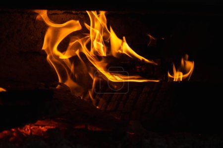 Photo for Burning wood in the fireplace - Royalty Free Image