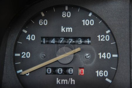 Foto de Speedometer on black. old model car speedometer - Imagen libre de derechos