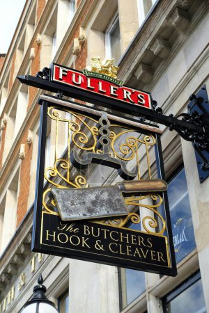 Photo for Sign for The Butchers Hook and Cleaver public house, 60 to 63 West Smithfield, London - Royalty Free Image