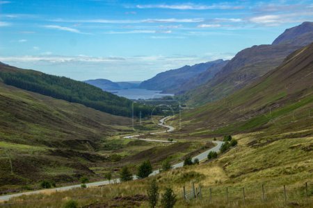 Photo for Loch Maree viewed from high up Glen Docherty with the road to Kinlochewe - Royalty Free Image