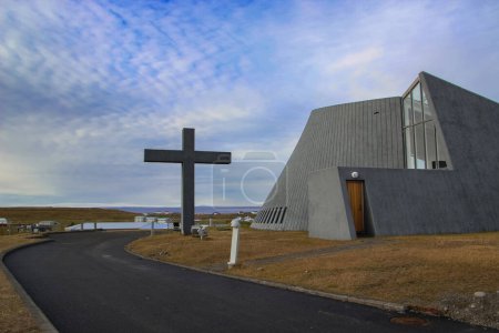 Photo for Modern church, concrete construction, with a large cross, new parish church, Bloendus, Blonduos, Iceland - Royalty Free Image