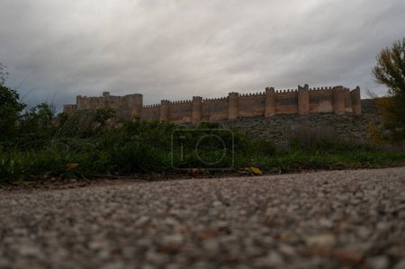 Aerial view of the Berlanga del Duero castle at dawn on a cloudy autumn day.