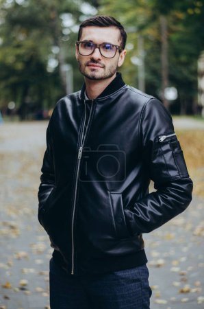 Photo for A man with glasses in a leather jacket - Royalty Free Image