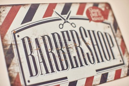 Photo for Vintage barber shop text sign in wall hairdresser white red blue colors - Royalty Free Image