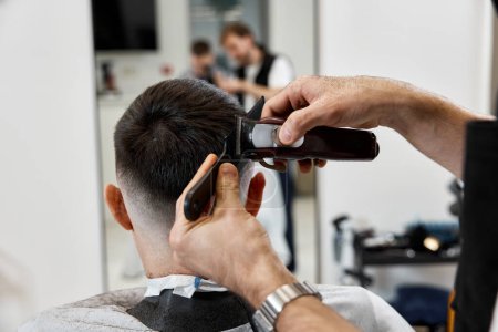 Photo for Barber shaving caucasian man in barber shop. close-up - Royalty Free Image