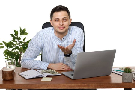 Photo for Smiling man looking at the camera, using laptop computer for online work at table on white background - Royalty Free Image