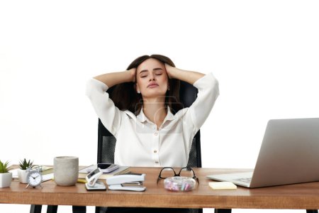Photo for Sad business woman have a headache, using laptop in office - Royalty Free Image