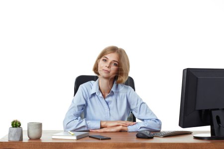 Photo for Successful business lady in blue shirt looking at camera in the office - Royalty Free Image