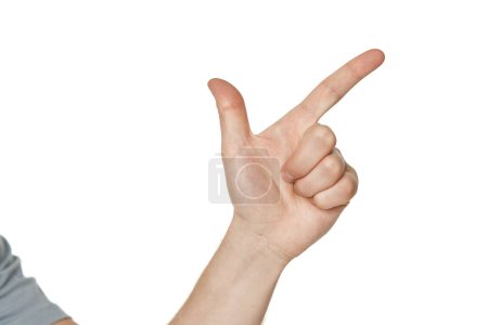 Photo for Male hand pointing to the right with the index finger on white background - Royalty Free Image