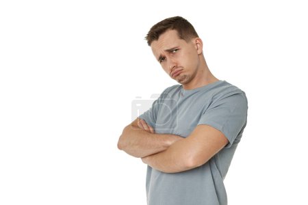 Photo for Portrait of offended frustrated young man on white background. sadness - Royalty Free Image