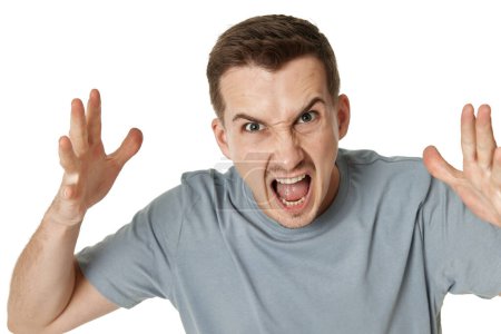Photo for Annoyed angry bearded man shouting on white studio background - Royalty Free Image