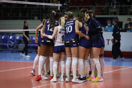 Photo for ISTANBUL, TURKEY - FEBRUARY 15, 2022: Fenerbahce Opet players celebrating score point during Beziers Volley CEV Champions League Volley match in Burhan Felek Sport Hall - Royalty Free Image