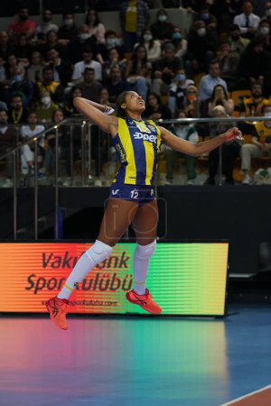 Photo for ISTANBUL, TURKEY - MARCH 31, 2022: Ana Cristina de Souza serves during Vakifbank vs Fenerbahce Opet CEV Champions League Volley Semi Final match in Vakifbank Sport Hall - Royalty Free Image