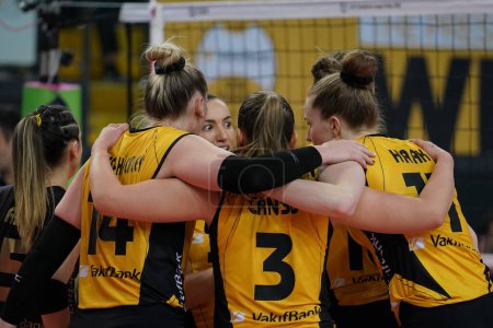 Photo for ISTANBUL, TURKEY - MARCH 31, 2022: Vakifbank players celebrating score point during Fenerbahce Opet CEV Champions League Volley Semi Final match in Vakifbank Sport Hall - Royalty Free Image