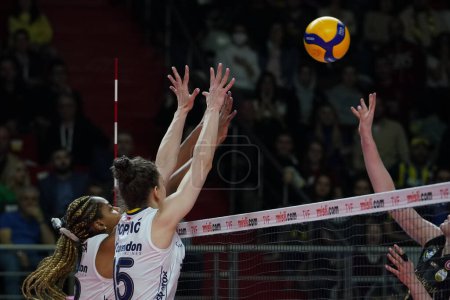 Photo for ISTANBUL, TURKEY - APRIL 30, 2022: Ana Cristina de Souza and Mina Popovic in action during Fenerbahce Opet vs Vakifbank Turkish Sultans League Playoff Final match in Burhan Felek Sport Hall - Royalty Free Image