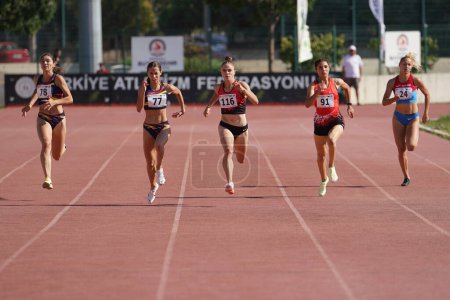 Photo for DENIZLI, TURKIYE - JULY 17, 2022: Athletes running 200 metres during Balkan Athletics U20 Championships in Denizli Albayrak Athletics Track - Royalty Free Image