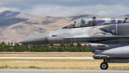 Photo for KONYA, TURKIYE - JUNE 30, 2022: Turkish Air Force Lockheed Martin F-16D Fighting Falcon (NW-15) taxiing in Konya Airport during Anatolian Eagle Air Force Exercise - Royalty Free Image