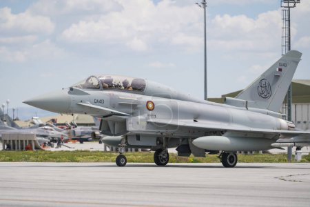 Photo for KONYA, TURKIYE - MAY 09, 2023: Qatar Air Force Eurofighter Typhoon EF2000 (MT002) taxiing in Konya Airport during Anatolian Eagle Air Force Exercise - Royalty Free Image