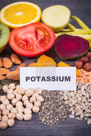 Photo for Inscription potassium with healthy nutritious eating containing natural minerals, vitamin K and dietary fiber - Royalty Free Image