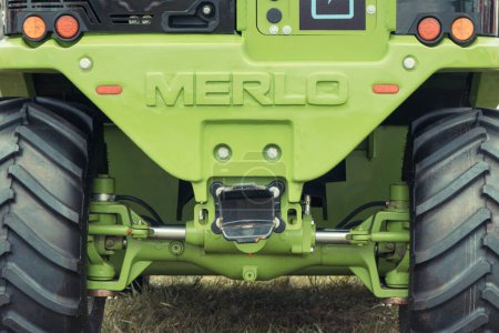 Photo for Bednary, Poland - September 25, 2021: Agroshow. Merlo brand loader or telehandler machine. Manufacturer agricultural and industrial equipment. Detail and part of vehicle - Royalty Free Image