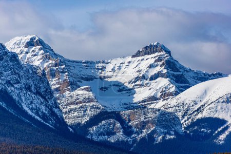 Closeup of snowcapped Mount Whyte and Mount Niblock in the Winter at Lake Louise in Banff National Park, Alberta, Canada.