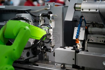 Téléchargez les photos : High-tech manufacturing process with robot programming arm in automation system - en image libre de droit