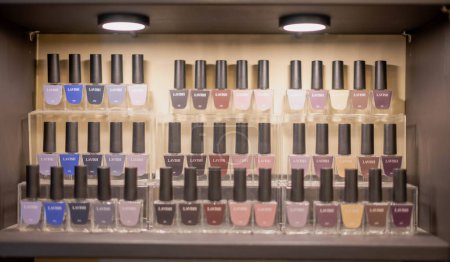 Photo for Bottles of colorful nail polish, and nail art colors at the nail shop and beauty salon. - Royalty Free Image