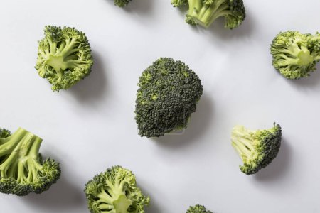 Photo for Top view of a fresh organic broccoli florets. Focus on the broccoli piece in the middle - Royalty Free Image