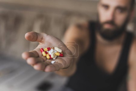 Photo for Close up of a handful of different pills and capsules. Selective focus on the pills - Royalty Free Image